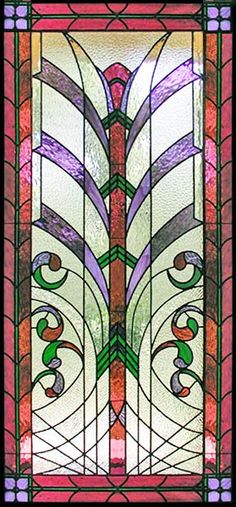 a stained glass window with an abstract design