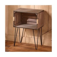 a small wooden table with two drawers on one side and hairpin legs on the other