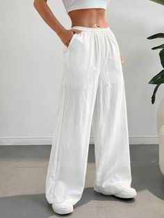 Style:Casual \nClosure Type:Drawstring Waist \nDetails:Pocket \nColor:White \nPattern Type:Plain \nType:Wide Leg \nFit Type:Loose \nLength:Long \nWaist Line:Natural \nMaterial:Cotton \nComposition:100% Cotton \nLining:100% Polyester \nCare Instructions:Machine wash or professional dry clean \nSheer:No \nFabric:Non-Stretch \nBody:Lined \nTemperature:Spring/Fall (18-25℃/63-77℉) \n White Bow Tie, White Bow, Drawstring Waist, Bow Tie, Style Casual, Wide Leg, Dry Clean, Solid Color, Free Shipping