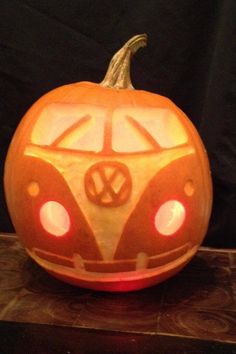 a pumpkin carved to look like a vw bus