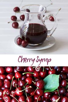 cherry syrup in a glass pitcher next to fresh cherries on a plate with leaves