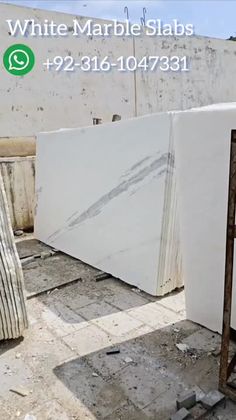 white marble slabs for sale on the ground