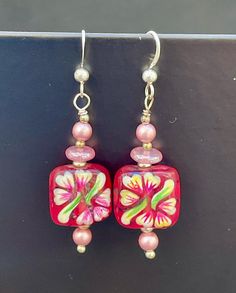 Floral Painted Art Glass Earrings With Swarovski Pearls, Czech Pressed Glass, and Sterling Silver - Etsy Pink Beaded Czech Glass Jewelry, Adjustable Red Flower Beaded Earrings, Handmade Pink Czech Glass Jewelry, Hand-painted Czech Glass Jewelry Gift, Hand Painted Czech Glass Jewelry Gift, Hand Painted Czech Glass Jewelry For Gift, Artistic Pink Flower Jewelry, Handmade Pink Glass Jewelry, Red Hand-painted Flower Earrings For Gifts