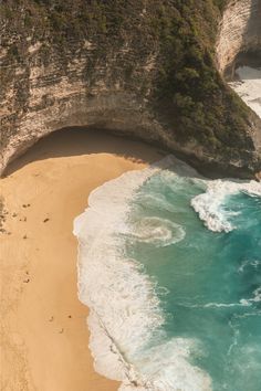 an aerial view of the beach and cliffs