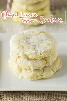 a stack of glazed lemon sugar cookies sitting on top of a white plate