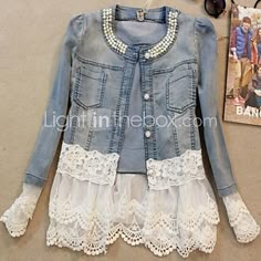 a denim jacket with white lace on the bottom and an image of a woman's shirt