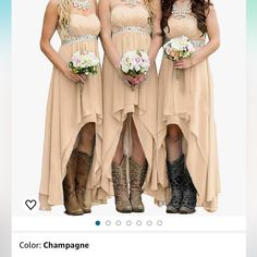 three bridesmaids in cowboy boots and dresses posing for a photo with their bouquets