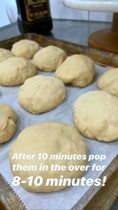 doughnuts sitting on top of a baking sheet with the words after 10 minutes pop them in the oven for 8 - 10 minutes