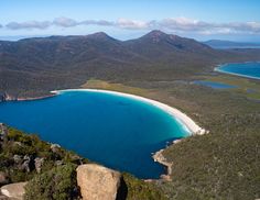 an aerial view of the blue water and white sand beach in australia's western territory