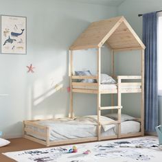 a child's bedroom with bunk beds and toys on the floor in front of a window