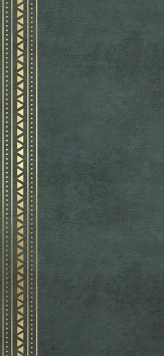 a green book with gold trimmings on the cover