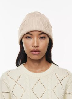 SNOWFLAKE BEANIE | Aritzia Adjustable Knitted Beige Beanie, Adjustable Cozy Beanie Bonnet, Cozy Adjustable Beanie Bonnet, Warm Winter Bonnet With Curved Brim, Cozy Adjustable Bonnet With Beanie Shape, Cozy Soft Knit Bonnet, Soft Beanie Hat One Size Fits Most, Winter Brimmed Bonnet, Fitted Beanie Cap For Fall