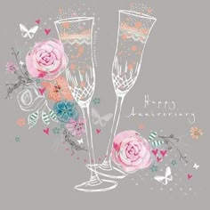 two champagne flutes with pink roses and butterflies on them, against a light gray background