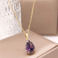 New Gold Plated Stainless Steel Purple Pear Shaped Pendant Necklace Lobster Clasp Closure With Extender Approx. 16-18” Purple Sapphire Necklace, Purple Teardrop Pendant Necklace For Formal Occasions, Dark Purple Jewelry, Dr Jewelry, Purple Pendant Necklace, Fairy Halloween, Purple Pendant, Fairy Halloween Costumes, Pear Shaped Pendant