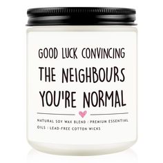 a white jar with black lid that says good luck convining the neighbors you're normal