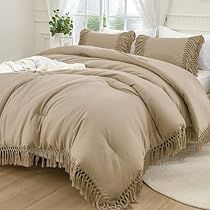 the comforter is made up and ready for someone to use it in their home