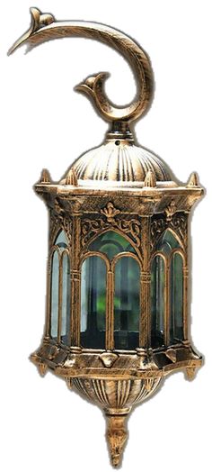 an ornate brass lantern with a crescent hanging from it's side and a bird on top