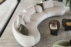 Receive grand and opulent functionality and style with the Amalfi XL curved sectional sofa from Nicoline Italia. The sensual shapes of this seating solution still evoke the admirable sensibilities of 70s aesthetics but are expanded upon with a more prominent silhouette. Curved beautifully, it makes an incredible addition to the center of the living room. Pairing a coffee table, armchairs, and the like is simple with its compliant personality. Sit or lounge easily with enough open space for se Curved Sectional Sofa, Curvy Sofa, Circle Sofa, Curved Couch, Funky Living Rooms, Curved Sectional, Luxury Italian Furniture, Modern Sofa Living Room, Unique Sofas