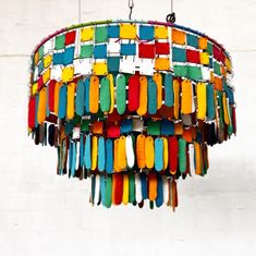 a multicolored chandelier hanging from a ceiling