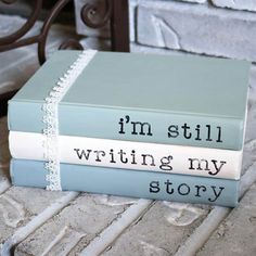 three books stacked on top of each other with the words i'm still writing my story