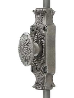 an ornate door handle on a white background