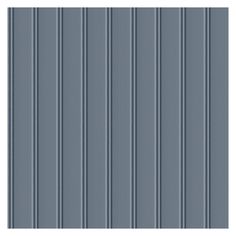 a gray wall with vertical stripes on it