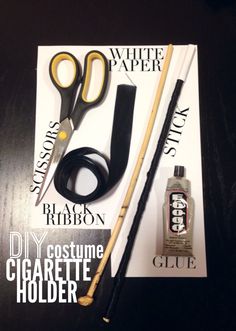 a pair of scissors, tape, and other items are sitting on the cover of a magazine