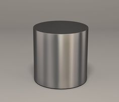 a round metal object sitting on top of a table