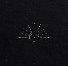 a black background with an arrow and sunburst