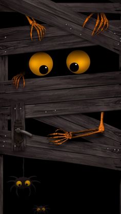 an animated halloween scene with pumpkins and jack - o'- lanternes hanging from the ceiling