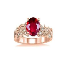 a ring with an oval red stone and white diamonds on the sides, set in 18k rose gold