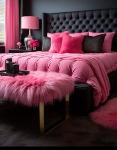 a bed with pink fur on it in a bedroom