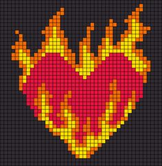 a cross stitch heart with flames in the shape of a red and yellow fireball