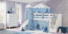 a child's bedroom with a princess castle bed and slide