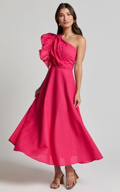 Get ready to turn heads in the Dixie Midi Dress - Linen Look One Shoulder Ruffle Dress In Raspberry. This stunning pink A-line dress is designed with a flattering one-shoulder neckline and playful ruffle detailing, making it perfect for your next party or special occasion. Made from high-quality cotton, this dress not only looks stylish but feels comfortable too. The midi length adds an elegant touch that can easily be dressed up or down. Embrace your unique style and make a statement with the D Spring A-line One Shoulder Cocktail Dress, Chic One-shoulder Bridesmaid Dress For Spring, Chic One Shoulder Bridesmaid Dress For Spring, Pink A-line Midi Dress With Ruffles, One Shoulder Midi Dress With Ruffles, One-shoulder Ruffle Bridesmaid Dress, Pink Summer Dress With Asymmetrical Neckline, One Shoulder Ruffled Bridesmaid Dress, Spring Bridesmaid One Shoulder Dress