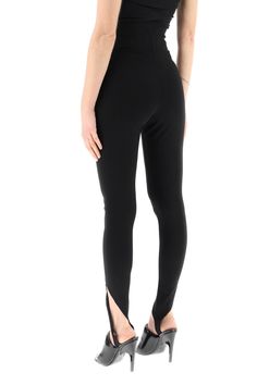 High-waisted leggings by The Attico in stretch techno jersey with shaped cuffs finished with elastic stirrups. Provided with side invisible zip fastening and enriched by a tonal logo embroidery on the waist. The model is 177 cm tall and wears a size IT 40. Stirrup Pants, Stirrup Leggings, 2023 Color, The Attico, Latest Fashion Design, Leggings Sale, Invisible Zip, Stirrups, Pink Leggings