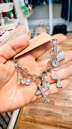 Travel Theme Charm Bracelet-Silver-Bracelets-Dear Me Southern Boutique, located in DeRidder, Louisiana Travel Charm Bracelet, Travel Charms, Travel Theme, Paris Theme, Silver Charm Bracelet, Clear Crystals, Travel Themes, Bracelet Silver, Toggle Clasp