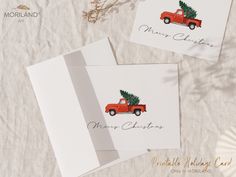 two christmas cards with the words merry christmas and a red truck carrying a tree on top