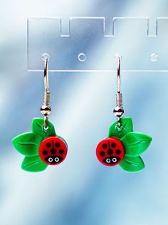 She's so small, you might miss her! This tiny LEGO® ladybug is perched on a leaf taking in the afternoon sun. Handmade from authentic LEGO® parts and are not glued so you can position the ladybug tile however you would like. Approx 1.5" in size. Lego Necklace, Lego Earrings, Lego Jewelry, Lego Accessories, The Ladybug, Bug Crafts, Lego Creative