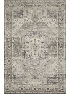 an area rug with grey and beige colors