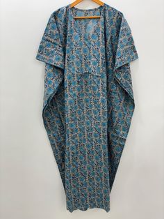 This Beautiful Hand Block Print Short Caftan or can be called as Tunic is made with super fine quality cotton and designs have been crafted by Handprints. Fabric - 100% Cotton Color - Gray Pattern - Floral Block Print Size - Plus Size, can fit Up to 4XL Bust size - Free Size (Drawstring) Long Kaftan - 51" Inches (Approx.) Short Kaftan - 31" Inches (Approx.) * It has Adjustable Drawstring Waist. * V Shape Neck Which is 8" Inches Deep. * Very comfortable to wear in both hot and cold weather. Note: Kaftan Women, Beach Caftan, Short Kaftan, Dress Kimono, Long Kaftan, Cotton Kaftan, Hand Block Print, Kimono Dress, Dress Short