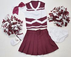 **all pieces are brand new** size girl's small -- fits little girl's size 5  measurements below-- adorable complete 8 piece set!  cheer  top & pleated skirt & bloomers 1  pair deluxe maroon / white pom poms 1 deluxe maroon/white cheer hair bow/ponytail holder pair of cheer socks arkansas & alabama colors i can add a logo for $10 top is 100% polyester  14" from shoulder to bottom hem & is approx. 12" across measured underarms laid flat not stretched.  skirt is 100% polyester.  pleated  skirt  waist measures approx. 10" unstretched/ 113" stretched & it's approx. 10.5" in front & 12" in back from waist to bottom hem outfit is ready to ship! your item will ship within 48 hours of payment! Cotton School Uniform Sets, White School Uniform Sets, White Cotton Cheerleading Sets, White Cotton School Spirit Sets, Pom Poms Cheer, Cheer Socks, Cheer Tops, Cheer Hair Bows, Bow Ponytail