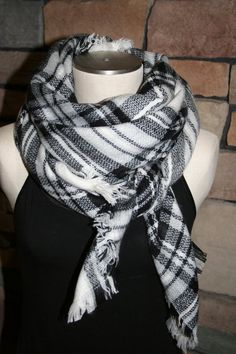 Large super soft, Black and white tartan plaid blanket scarf in plaid print.Blanket scarves are great for the cooler months of fall and winter. The scarves can be used as blankets-great for fall football games where you can show you school pride with scarves in your school colors. All 4 sides have fringe. The scarves cans be worn a variety of ways-as a shawl that is belted, wrapped around the neck, or draped loosely and tied in front.Material content is Acrylic/wool blend!These blanket scarves m Tartan Blanket Scarf, Zara Style, Blanket Scarves, Fall Football, Tartan Blanket, Plaid Blanket Scarf, Plaid Blanket, Zara Fashion, School Pride