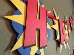 the letters h are made out of paper