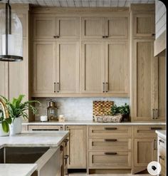 a kitchen with wooden cabinets and white counter tops