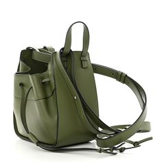 This is an authentic LOEWE Calfskin Mini Hammock Shoulder Bag in Avocado. This chic tote is crafted of grained leather in green. It features a unique one-piece reinforced design with leather top handles and an optional adjustable shoulder strap. The drawstring pulls on either side open to a beige fabric interior with patch pockets. Beige Fabric, Leather Top, Hammock, Patch Pocket, Calf Skin, Avocado, Shoulder Strap, Handles, One Piece