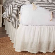 PRICES MAY VARY. One Queen Bedskirt, fits a queen boxspring, 60" x 80" decking, with a 16" drop from the top of the boxspring to the floor. Features split corners so it fits around any bed foot board. Simple styling to coordinate with any bedding. Bed skirt is gathered. 100% cotton with a slub weave that provides beautiful linen-like texture in an antique, soft white color. Machine wash cold with like colors on gentle cycle, no chlorine bleach. Tumble dry low, remove promptly, iron as needed. Th Primitive Bedding Kitchen, Sage Bed Skirt, All White Farmhouse Bedding, Canvas Drop Cloth Bedding, White Comforter With Bedskirt, Bed Skirt Grey Comforter, Bedskirt With Quilt, Waverly Bed Skirts, Full Size Bedskirts