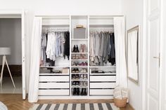 the closet is clean and ready to be used as a dressing room or bedroom area