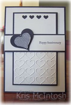 an anniversary card with two hearts on it