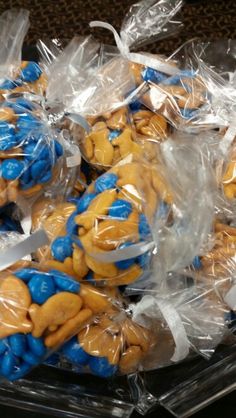 some blue and yellow cookies wrapped in plastic